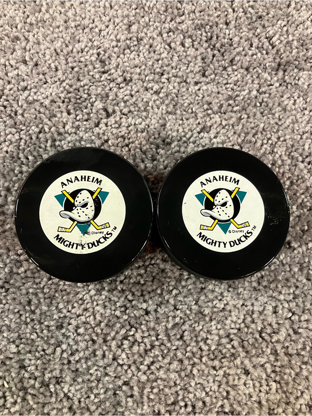 Vintage Anaheim Mighty Ducks 1993 NHL Logo Official Hockey Puck Trench Lot (2)